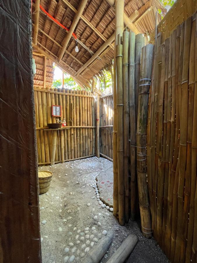Hostel Tribal Huts Community Daanbantayan Zimmer foto