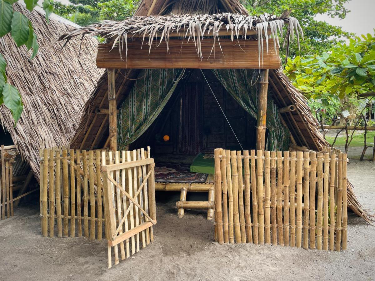 Hostel Tribal Huts Community Daanbantayan Zimmer foto